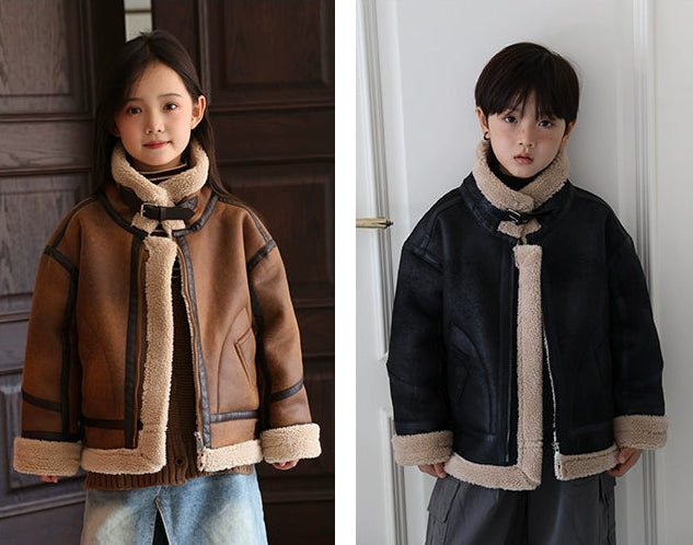 Two children wearing jackets with fur-lined collars in different colors.