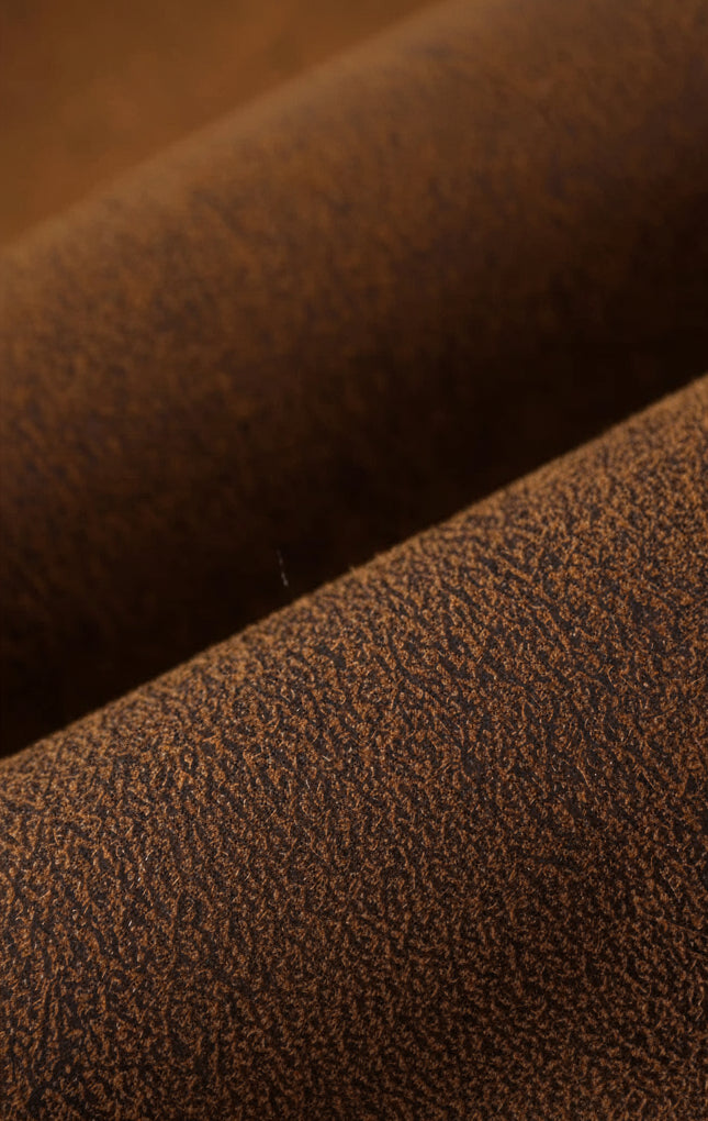 Text on a brown leather background with product details