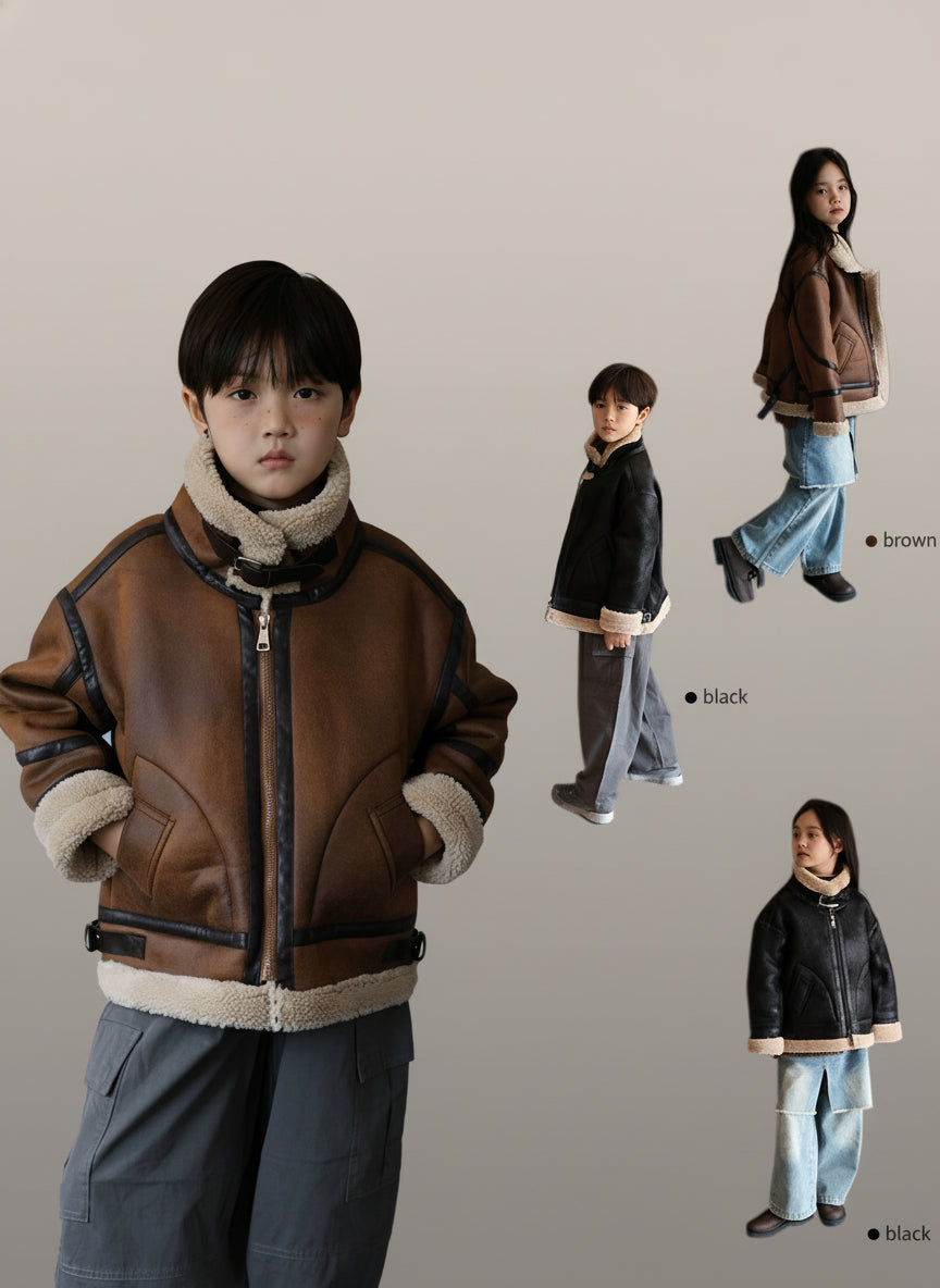 Children wearing brown and black leather jackets with fur-lined cuffs on a neutral background.