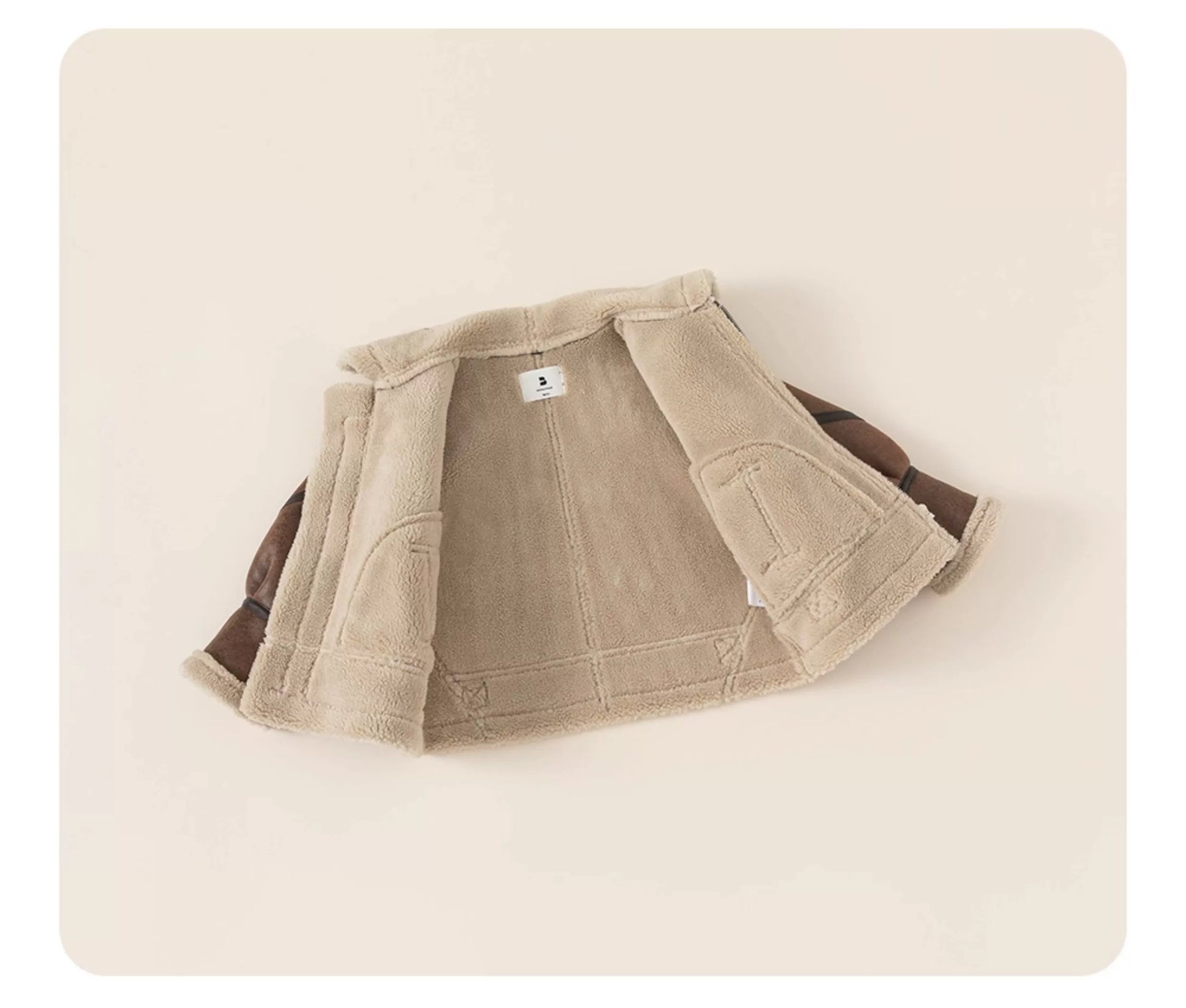 Beige jacket on a beige background