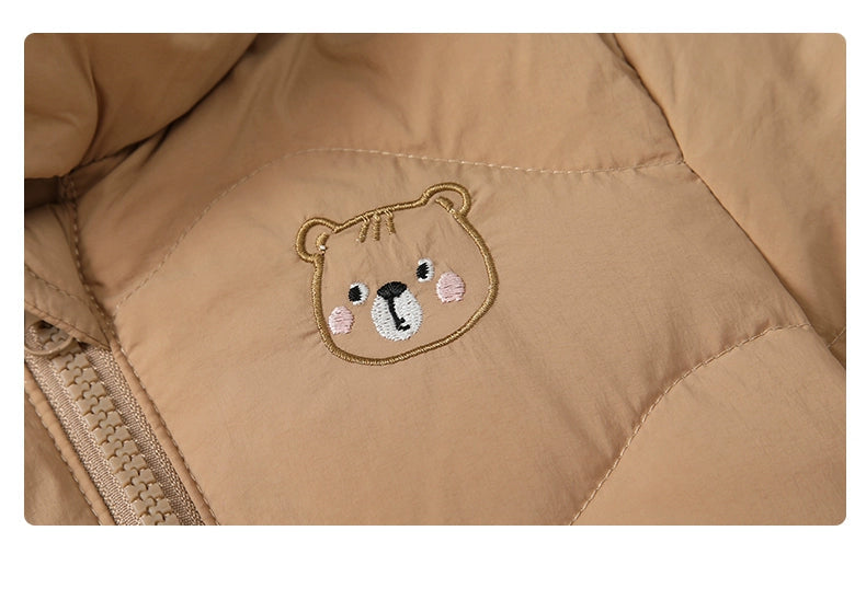 Brown jacket with embroidered bear face design on a plain background